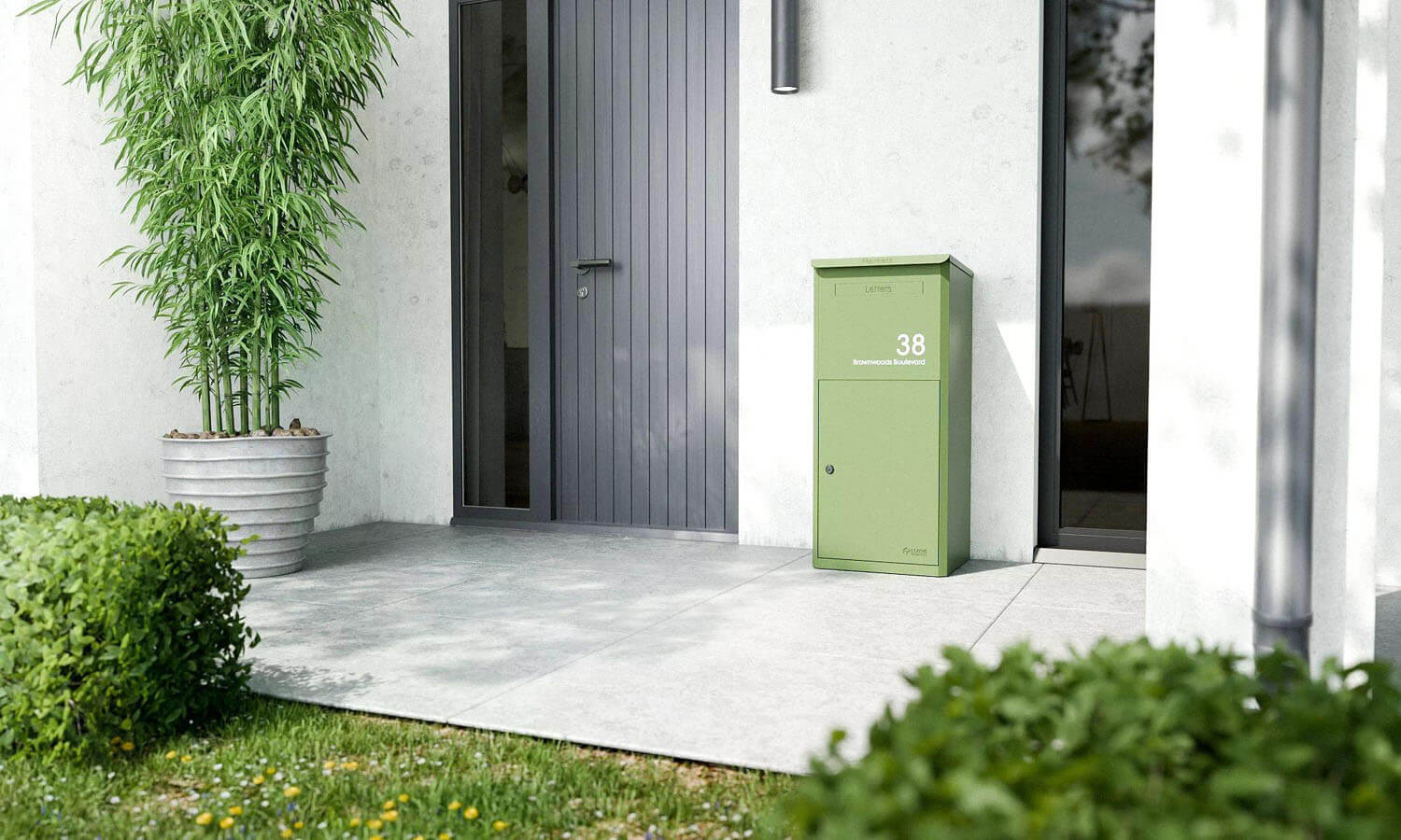 Grön paketbrevlåda med tömning fram eller bak